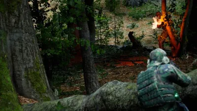 Bodycam operator moving through a low-light battlefield